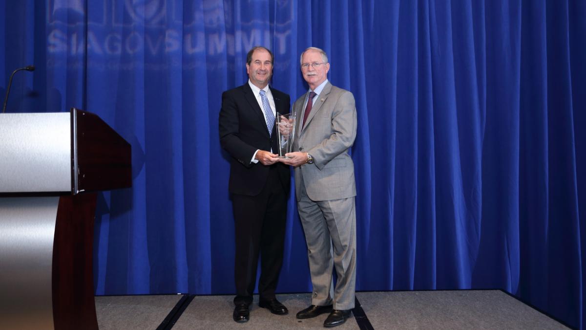 Rutherford Accepting Award