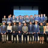 Congressman Rutherford with FL-05 Nominated Students in front of a stage with Rep.Rutherford in the Center.