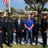 Representative Rutherford with officers from Jacksonville Sheriffs Office in Northeast Florida.