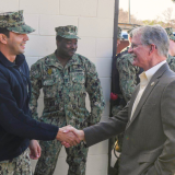 Rep. Rutherford shakes hands with members of the U.S. Navy in Jacksonville, Florida.