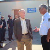 Representative John Rutherford speaking with EMT